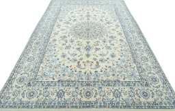 Surface texture of New Nain rug with natural Wool and intricate pattern