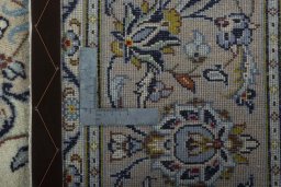 Surface texture of 2000s Kashan rug with natural Wool and intricate pattern