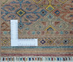 Corner detail of New Samarkand rug showing border pattern and Wool pile