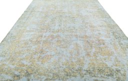 Surface texture of 1950s Vintage rug with natural Wool and intricate pattern