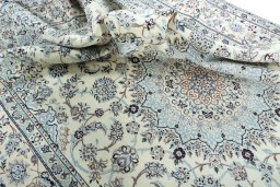 Surface texture of New Nain rug with natural Wool and intricate pattern
