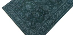 Backside of handmade New Farahan rug showing knot structure and weave density