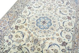 Backside of handmade New Nain rug showing knot structure and weave density
