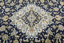 Central medallion detail of 2000s Kashan rug from Iran / Persia