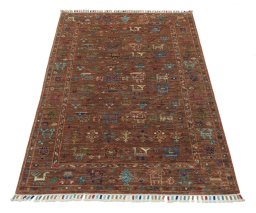 Surface texture of New Samarkand rug with natural Wool and intricate pattern