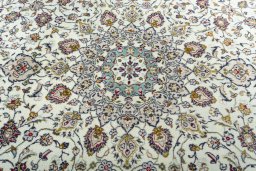 Central medallion detail of 2000s Kashan rug from Iran / Persia