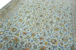 Backside of handmade 2000s Kashan rug showing knot structure and weave density