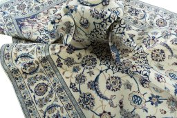 Surface texture of New Nain rug with natural Wool and intricate pattern