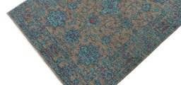 Backside of handmade New Farahan rug showing knot structure and weave density