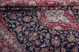 Close-up detail of 2000s Kashan rug from Iran / Persia showing Cork weave