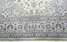 Full view of New Kashan rug from Iran / Persia, 298 × 202 cm in Beige tones