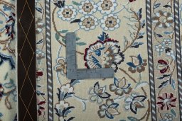 Backside of handmade 2000s Nain rug showing knot structure and weave density