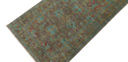 Backside of handmade New Farahan rug showing knot structure and weave density