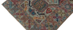 Backside of handmade New Kazak rug showing knot structure and weave density