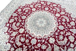 Backside of handmade New Nain rug showing knot structure and weave density