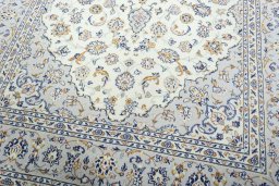 Close-up detail of New Kashan rug from Iran / Persia showing Wool weave