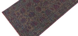 Backside of handmade New Farahan rug showing knot structure and weave density