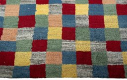 Central medallion detail of 2000s Persian Gabbeh rug from Pakistan
