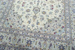 Close-up detail of 2000s Kashan rug from Iran / Persia showing Wool weave