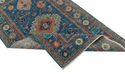 Central medallion detail of New Kazak rug from Pakistan