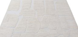 Backside of handmade New Morocco rug showing knot structure and weave density