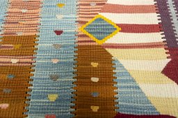 Backside of handmade New Kilim Dastan rug showing knot structure and weave density