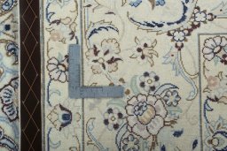 Backside of handmade 2000s Nain rug showing knot structure and weave density
