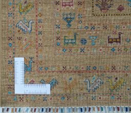 Corner detail of New Samarkand rug showing border pattern and Wool pile