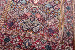 Close-up detail of 2000s Kashan rug from Iran / Persia showing Wool weave