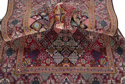 Surface texture of 2000s Kashan rug with natural Wool and intricate pattern