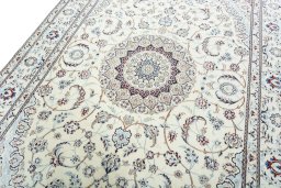 Backside of handmade New Nain rug showing knot structure and weave density