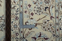 Backside of handmade 2000s Nain rug showing knot structure and weave density