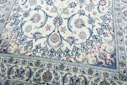Close-up detail of New Nain rug from Iran / Persia showing Wool weave