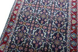 Backside of handmade 2000s Najafabad rug showing knot structure and weave density