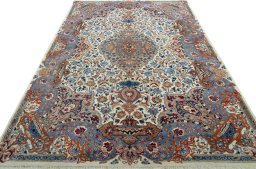 Surface texture of 2000s Kashmar rug with natural Wool and intricate pattern