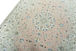 Backside of handmade New Kashan rug showing knot structure and weave density