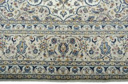 Full view of 2000s Kashan rug from Iran / Persia, 490 × 336 cm in Beige tones