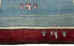Central medallion detail of 2000s Persian Gabbeh rug from Pakistan