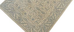 Backside of handmade New Farahan rug showing knot structure and weave density