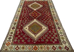 Surface texture of 1970s Persian Gabbeh rug with natural Wool and intricate pattern
