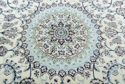 Central medallion detail of 2000s Nain rug from Iran / Persia