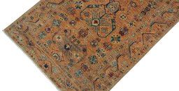 Backside of handmade New Kazak rug showing knot structure and weave density