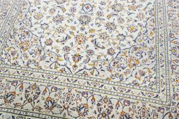 Close-up detail of 2000s Kashan rug from Iran / Persia showing Wool weave