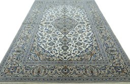 Surface texture of 2000s Kashan rug with natural Wool and intricate pattern