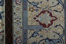 Backside of handmade 2000s Nain rug showing knot structure and weave density
