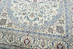 Close-up detail of 2000s Nain rug from Iran / Persia showing Wool weave