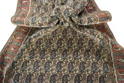 Corner detail of 1950s Ghom rug showing border pattern and Wool pile