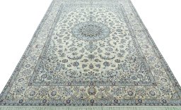 Surface texture of 2000s Nain rug with natural Wool and intricate pattern