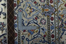 Central medallion detail of 2000s Kashan rug from Iran / Persia