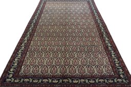 Surface texture of 1930s Hamedan rug with natural Wool and intricate pattern